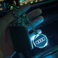 Avaimenperä, jossa on kristallinen 3D-autoteollisuuden logo